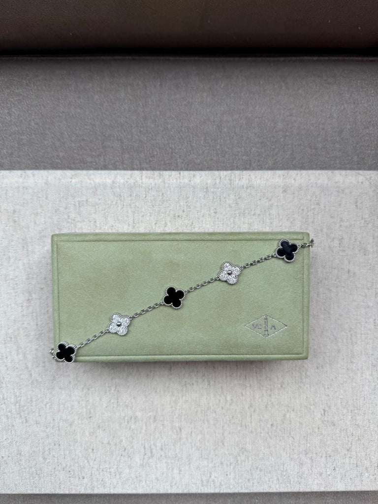 Van Cleef Arpels 5 motif white gold onyx 2023