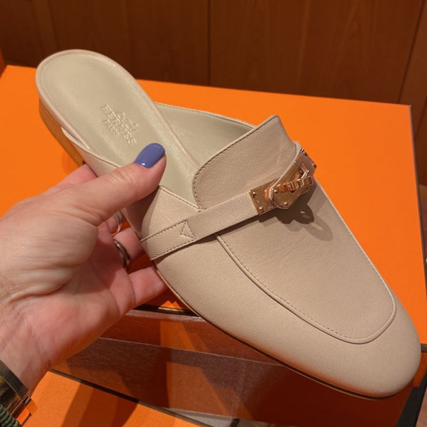 Hermes Oz mules in beige