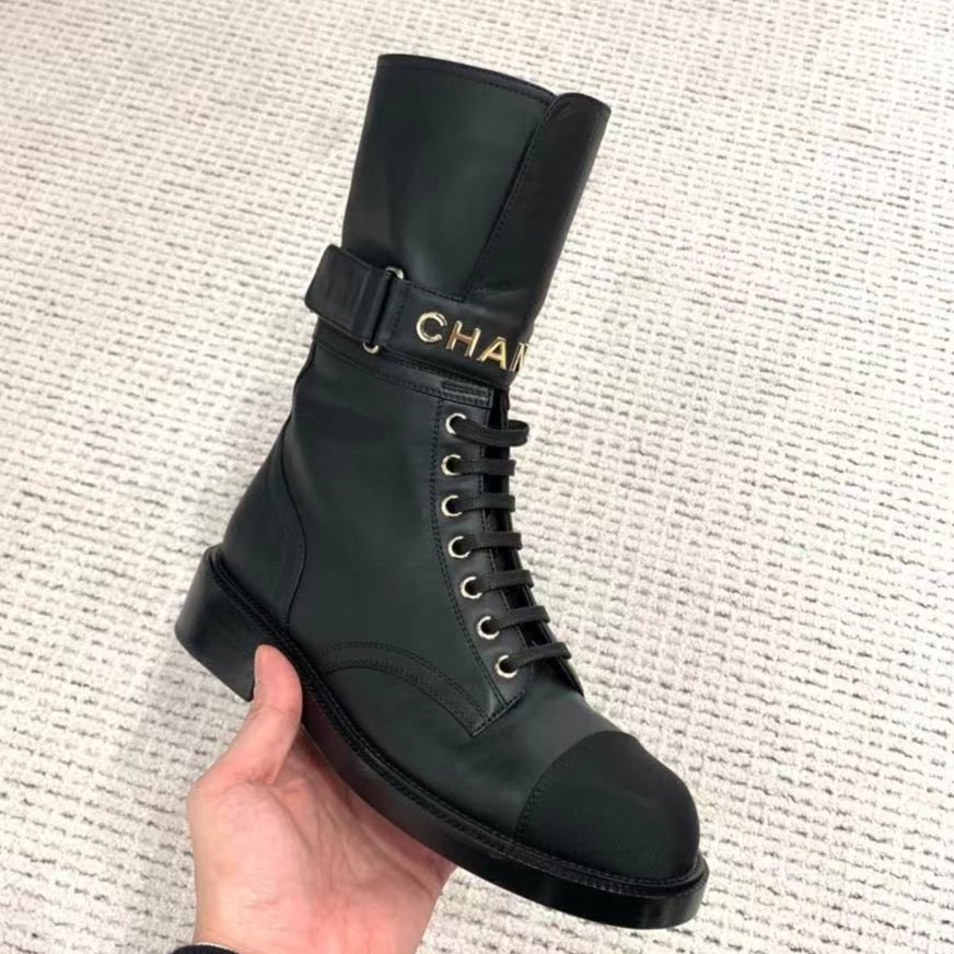 CHANEL Fall-Winter 22/23 black lace up boots