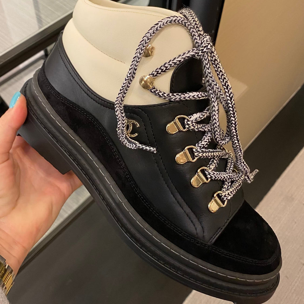 CHANEL Fall-Winter 22/23 black lace-up boots